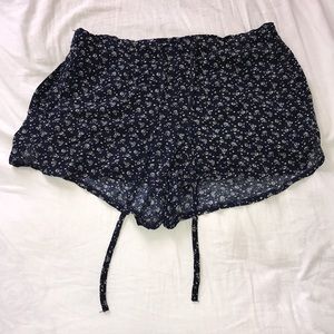 Brandy Melville John galt floral blue shorts